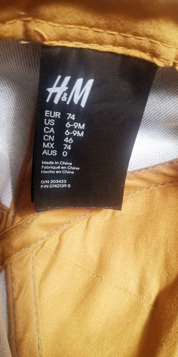 Bawełniana czapka chłopięca z daszkiem i aplikacją NY, H&M, rozm 74