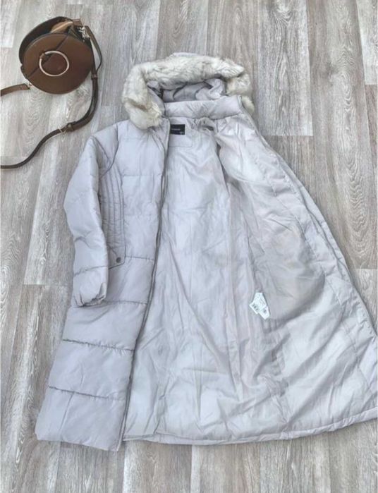 Пуховик жіночий фабрична якість