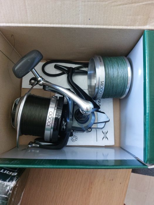 Wędki karpiowe kołowrotki pokrowiec avid solar shimano