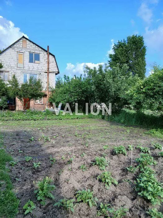 Продам будинок на 10 сот.Троєщина.вул. М.Смотрицького( Пожарського )