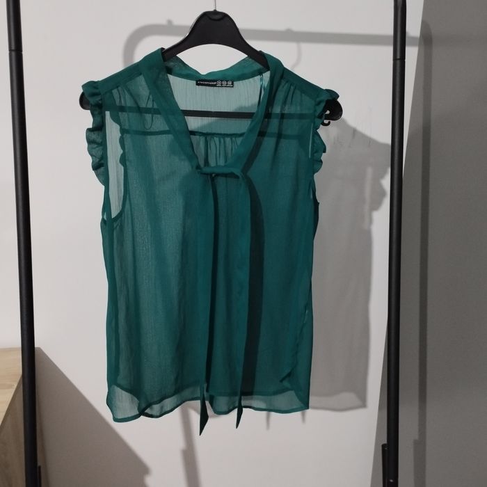 Piękna bluzeczka butelkowej zieleni.