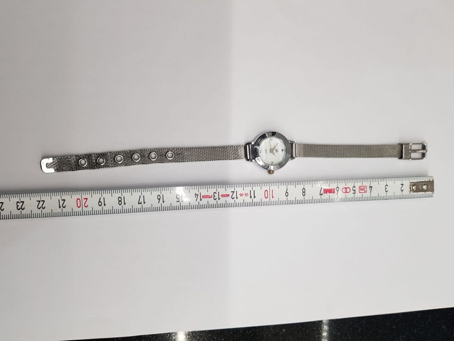 Stary zegarek damski OL 01 vintage srebrny