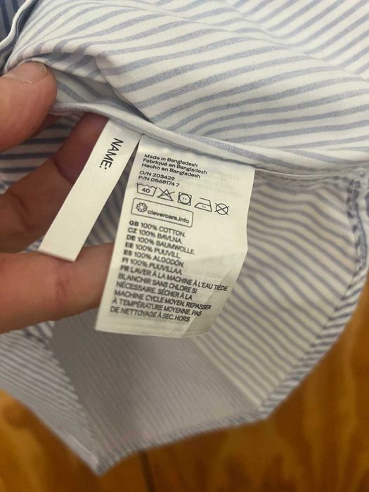 Camisa de menino ás riscas azuis marca LOGG da H&M