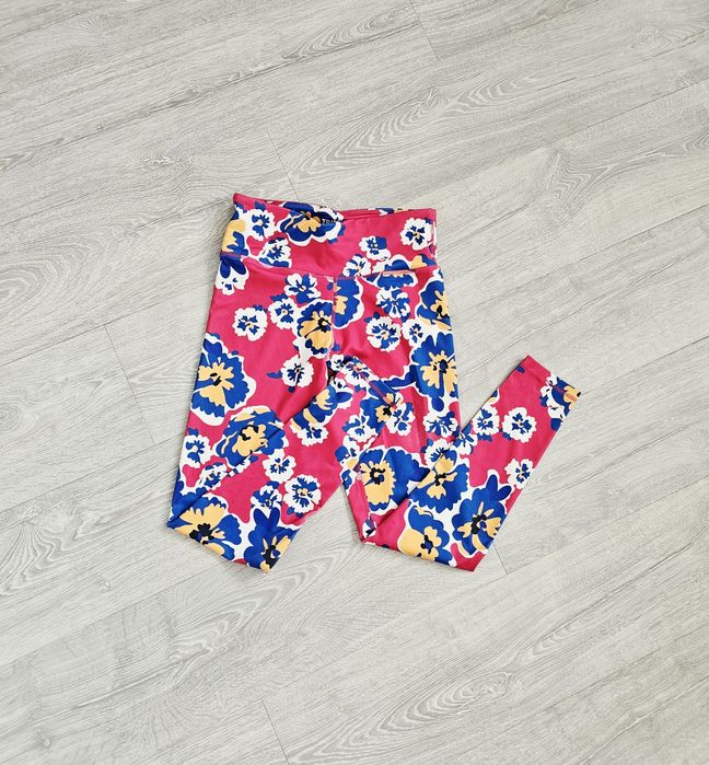 Kolorowe legginsy w kwiaty Tridri s 36