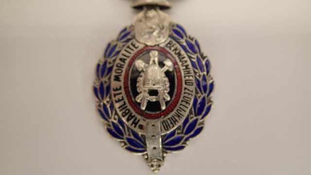 Medalha antiga  de peito de origem  Belga