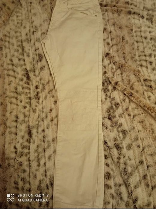 Białe jeansy Zara 36