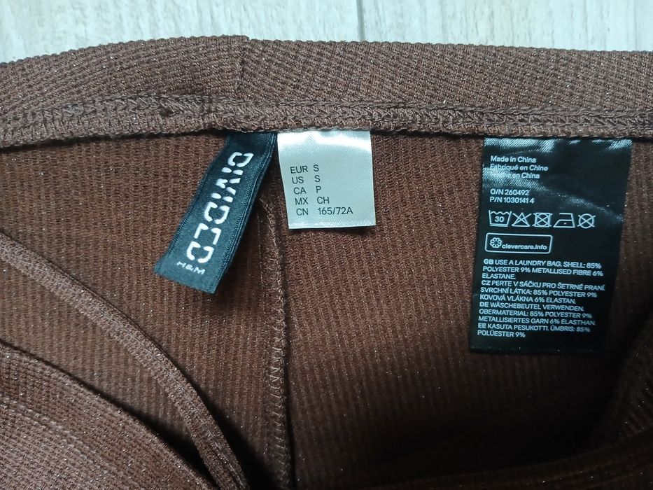 Коричневі штани кльош з блискітками D.ivided H&M (розмір  S)