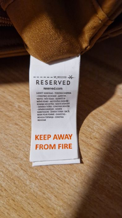 Torebka Reserved, motyw skóra węża