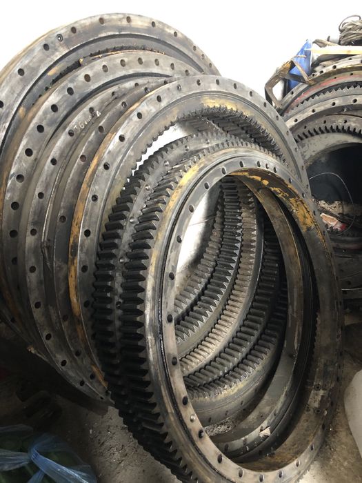 Поворотний круг екскаватора Atlas, Liebhett, Cat