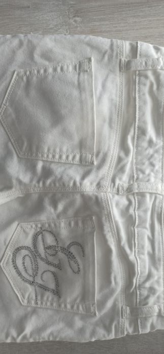 Białe z dżinsowego streczu rurki Guess. R 152 cm. Stan bardzo dobry.