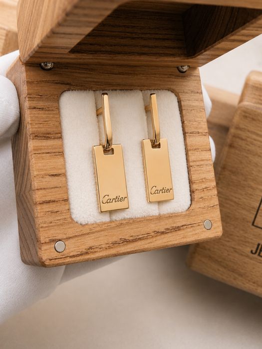 Золоті сережки 585 cartier вагою 6,6 г.