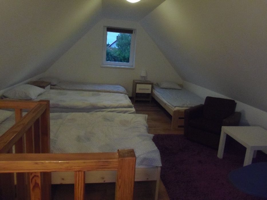 Domek nad jeziorem w Spychowie na Mazurach.