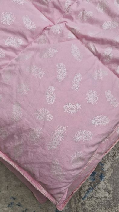 Новенька пір'яна ковдра-перина