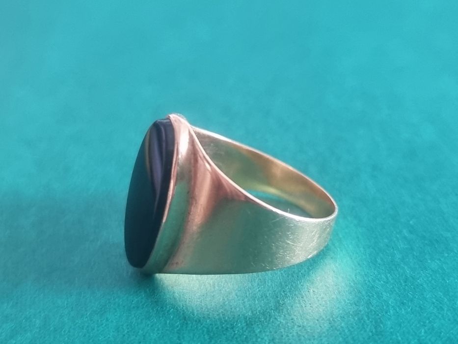 Anel ouro 19k com onix preto