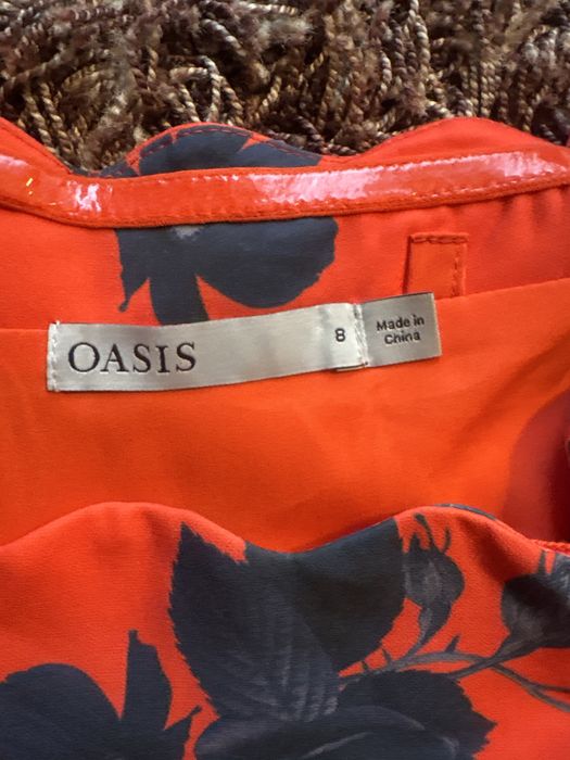 Przepiękny kombinezon z Oasis