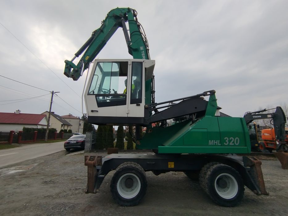 Fuchs mhl 320 koparka przeładunkowa koparka do złomu libherr 904 340