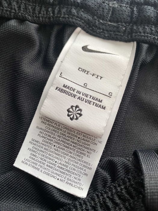 NIKE r.L oryginalne spodnie sportowe stan BDB