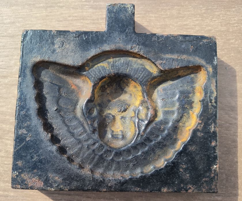 Molde de anjo em ferro fundido