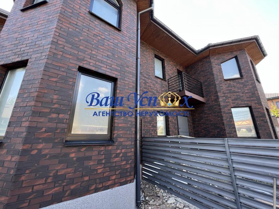 Продажа нового дюплекс  дома в городке охрана. Ирпень. Лес.