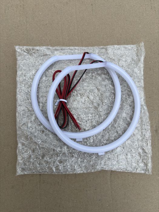 BMW E39 Ringi Cotton POLIFT Hella zestaw Plug and Play Mocne Białe
