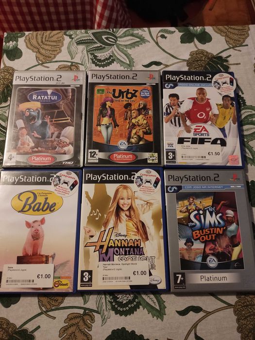 PlayStation 2 + 2 joysticks + 6 jogos