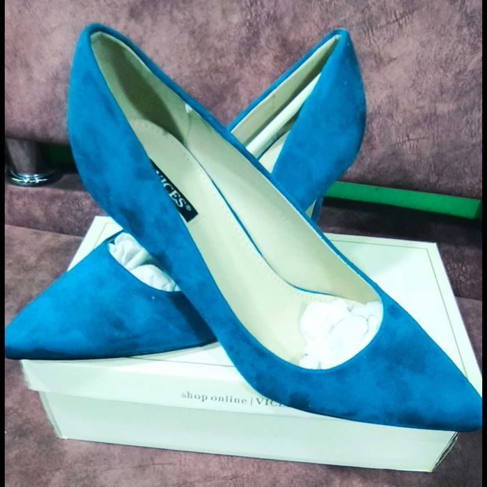 Туфлі на шпильці