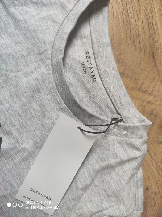 Dwie Nowe bluzki r.140 reserved
