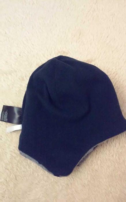 Czapka z nausznikami H&M dinozaury 110 - 128 cm. na 4 - 8 lat