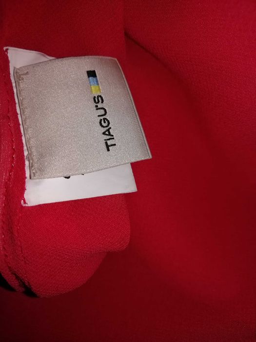 Roupa diversa como nova