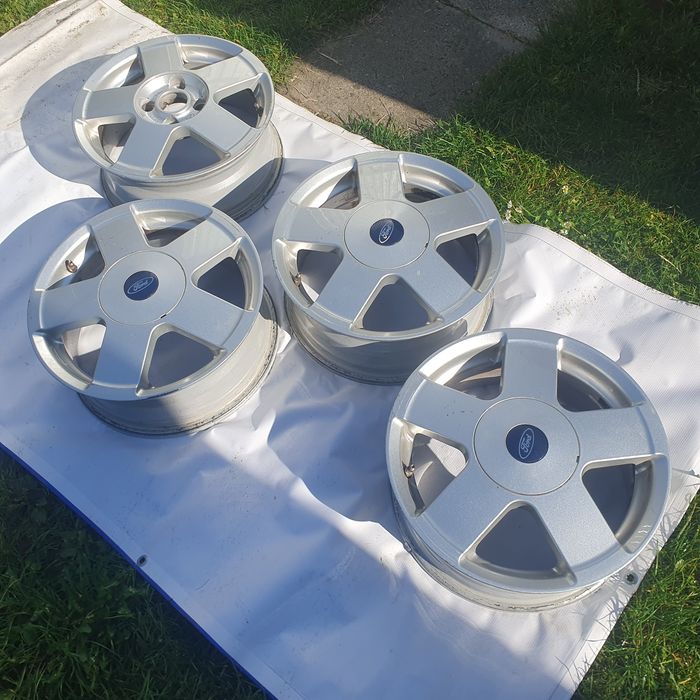 Felgi aluminiowe Borbet alufelgi srebrne 15" Ford Focus Mk1 6Jx15 H2