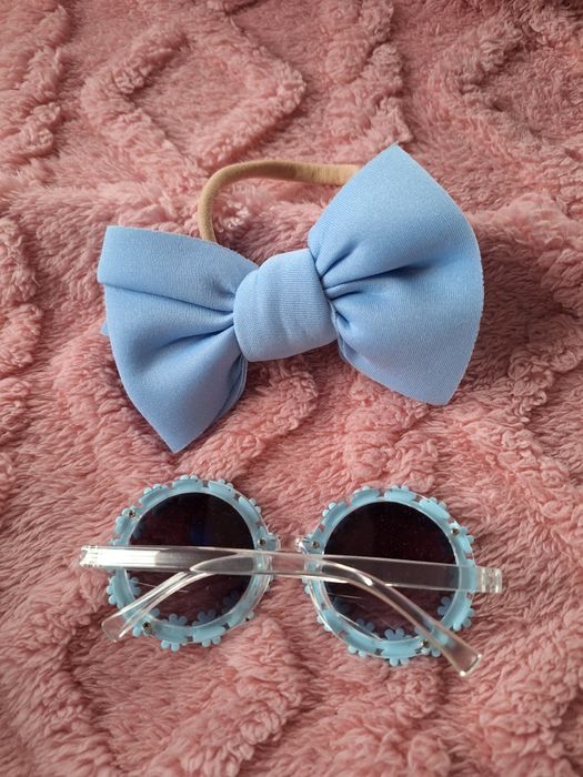 Nowe niebieskie dziecięce okulary przeciwsłoneczne dla dziecka dziewcz
