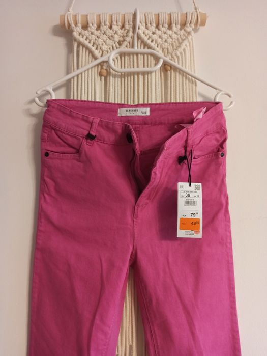 Nowe spodnie różowe Reserved r. 38