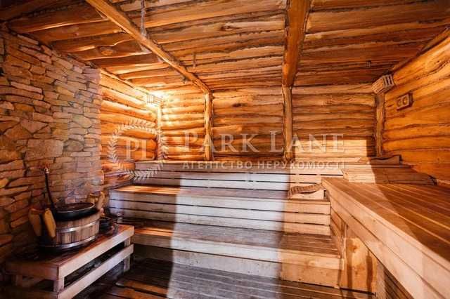 Казкове шале в Лебедівці, ділянка 1,4 га з виходом на воду.