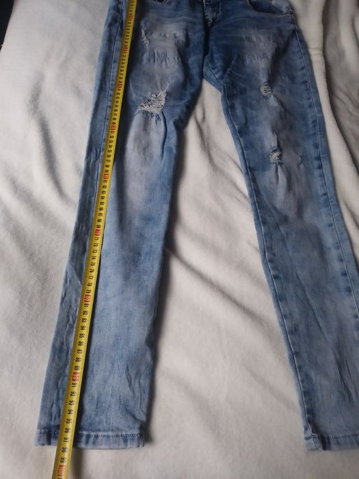 Spodnie jeans 40.        14