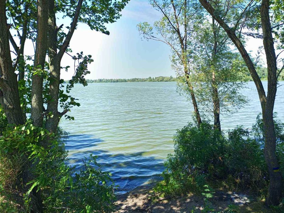 Продаж ділянки під забудову перша лінія від водойми на Троєщині без%