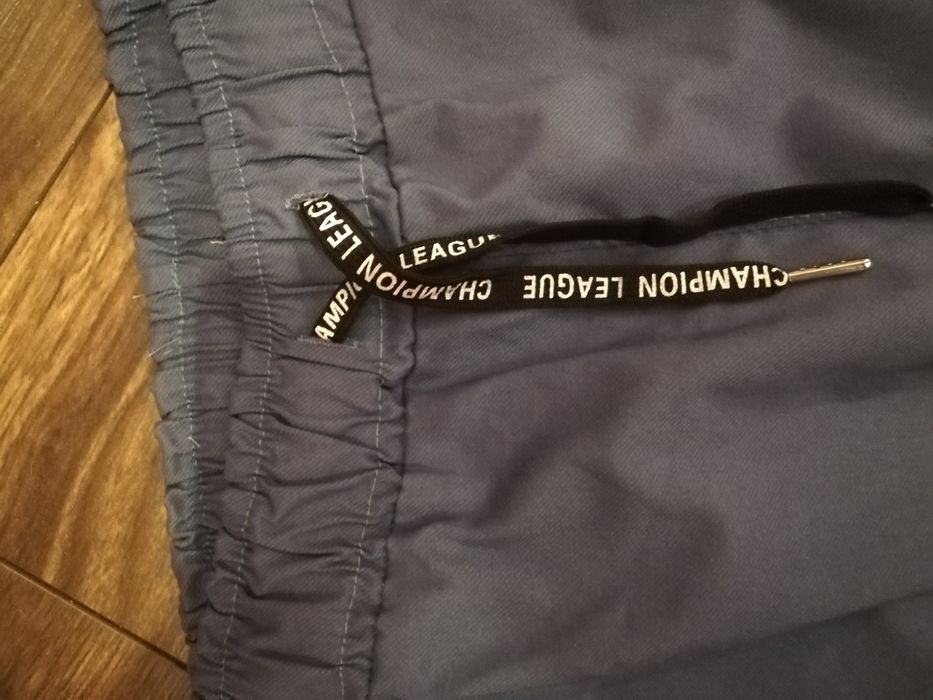 Spodnie z lampasem 5 XL kolor  jeansowy NOWE