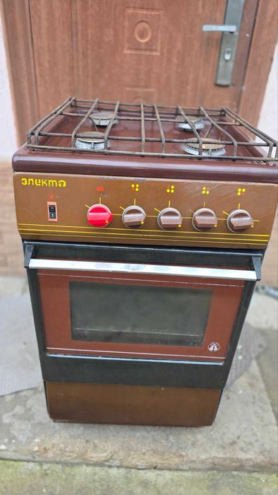 Плита газовая "Электа" 4-х камфорная. коричневая рабочая !