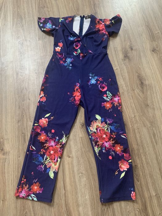Granatowy kombinezon w kwiaty spodnium r.44