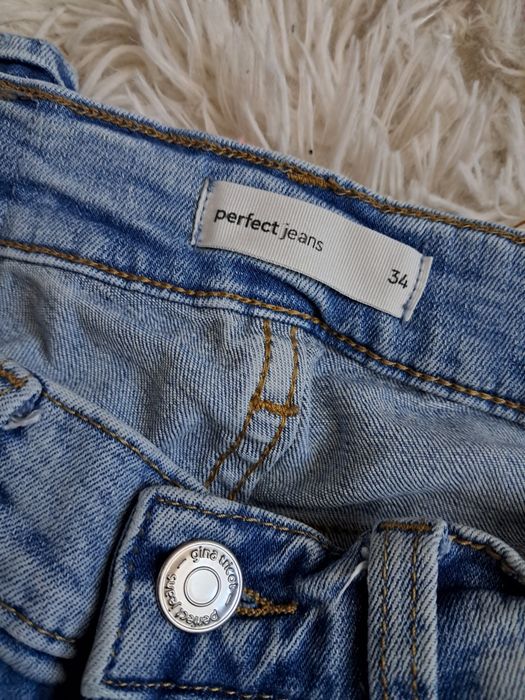 Dzwony jasnoniebieskie jeansowe Ginatricot XS wysoki stan