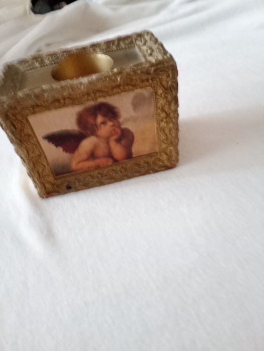 castiçal em madeira dourada