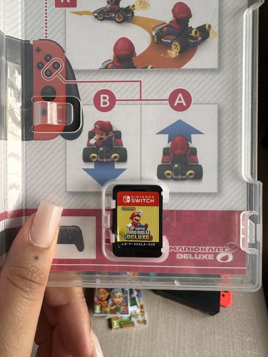 Nintendo Switch + Comandos + Jogos