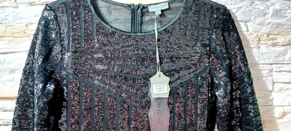 Sukienka z cekinów Nowa 38