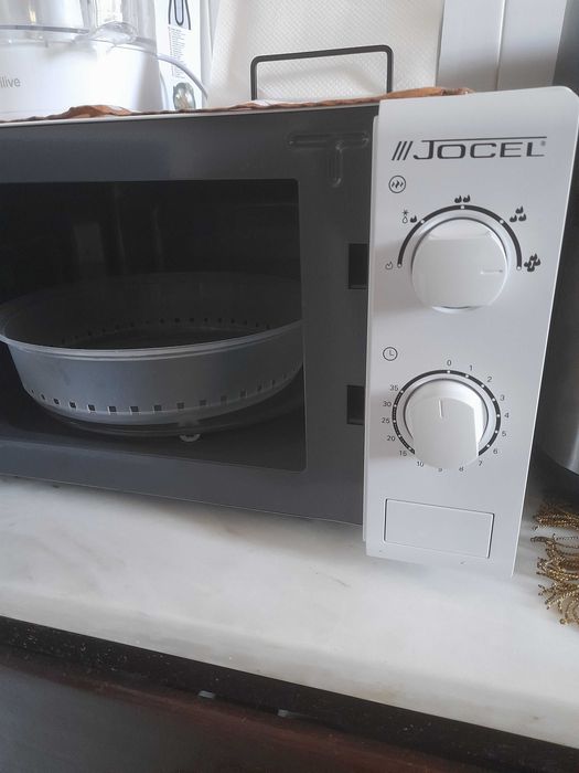 Microondas como novo.
