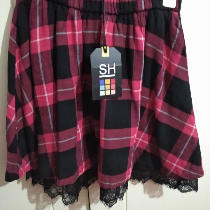 Vestido e um macacão