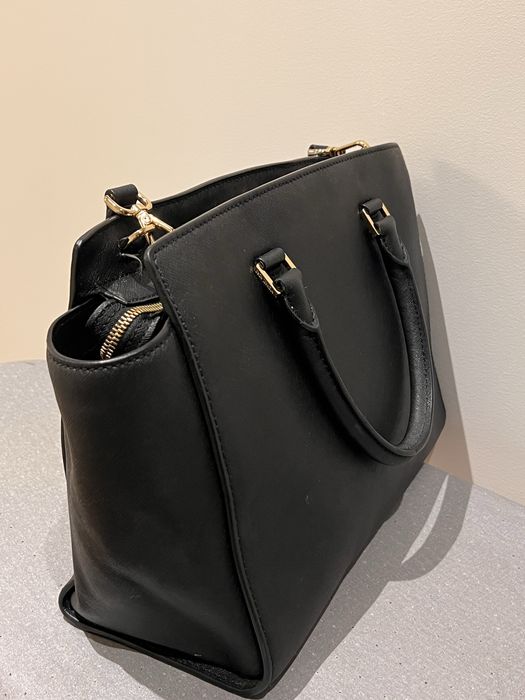 Mala Michael Kors com alça tira colo