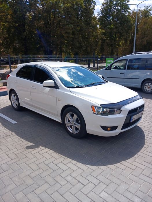 Mitsubishi Lancer 2009 VIN JMBLTCX3A9U002885 фото оголошення 3 з 18