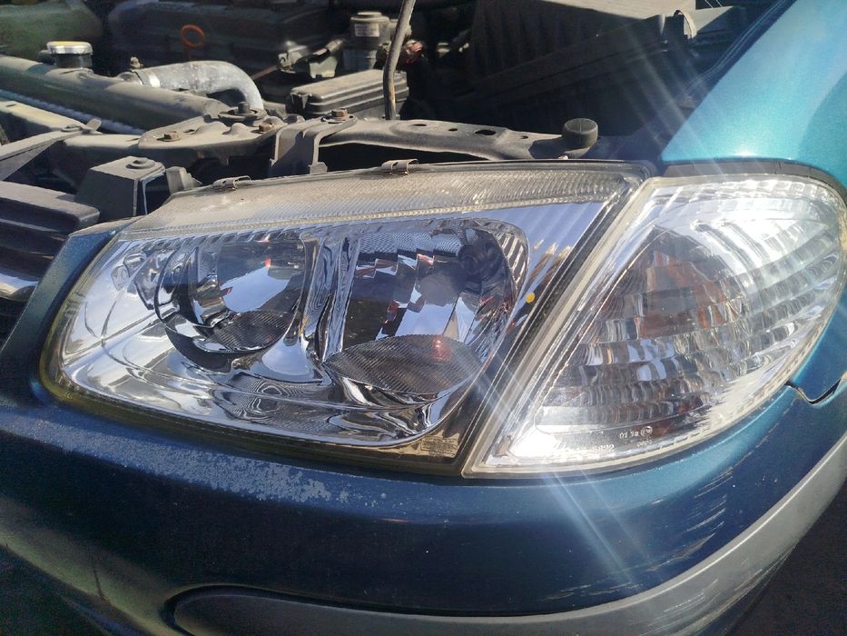 Ótica / farol esquerda NISSAN Almera II Hatchback (N16)