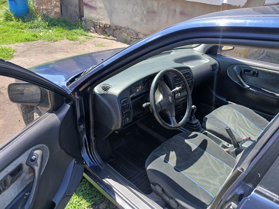 Нісан примера w10 2.0 газ/бензин.