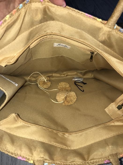 Mala e chapéu de praia nova