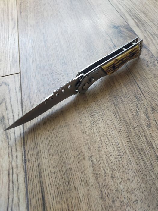 Nóż sprężynowy, składany